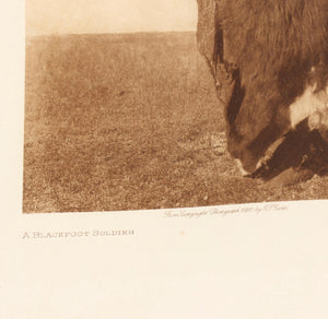 Edward S. Curtis (American, 1868–1952) A Blackfoot Soldier; Photogravure.